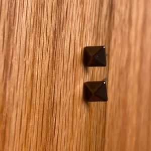 Black pair of earrings